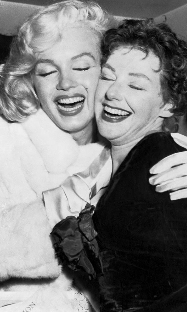original caption marilyn monroe, l is hugging her sister in law, joan copeland, at a party in the barbizon plaza hotel to celebrate the latters opening in the noel coward play, conversation piece joan is a sister of marilyns husband, playwright arthur miller