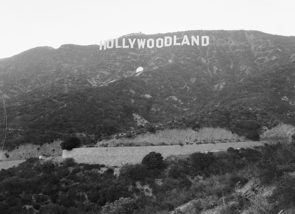 original caption california actress ends life with hump from hollywood sign pictured above is the giant sign overlooking hollywood, california, from which lillian millicent peg entwistle jumped from the letter h to end her life after failure to star in the movies