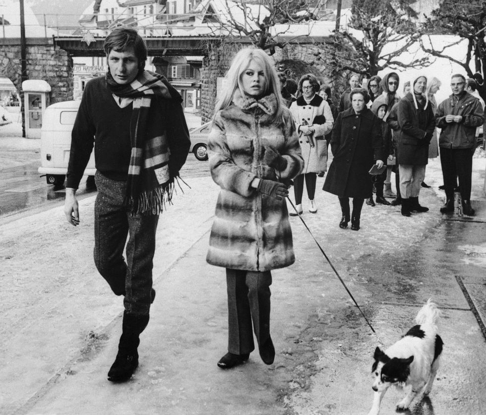 Brigitte Bardot and Husband Walk the Dog