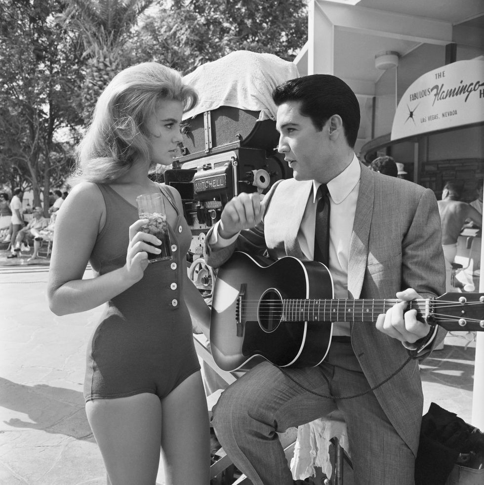 Ann-Margret and Elvis Presley rehearse the duet they are to sing in the film Viva Las Vegas.