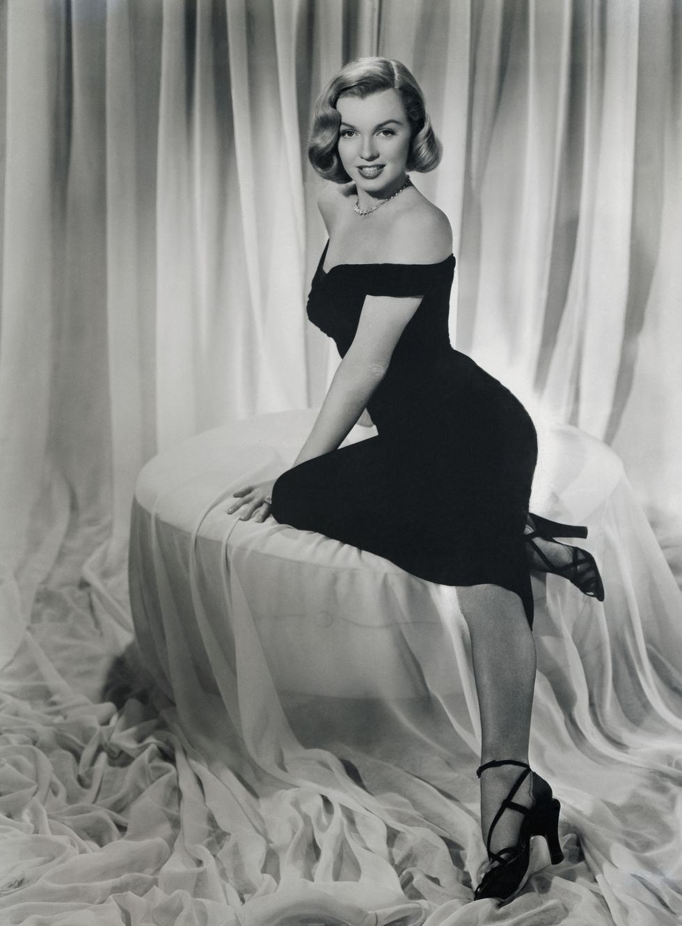 original caption the editors of the the stars and stripes us occupation forces newspaper, announced their unanimous choice of miss cheesecake of 1950 the editors tapped the shapely shoulder of marilyn monroe, 18 year old hollywood starlet, whom they described as a lovesome buxom blond