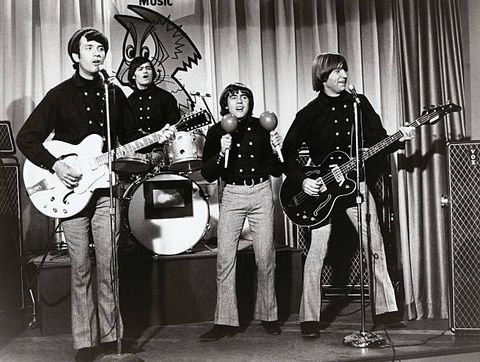 a scene from the us television series, the monkees, featuring the pop singing group, the monkees, who include, left to right, michael nesmith, mickey dolenz, davy jones, and peter tork
