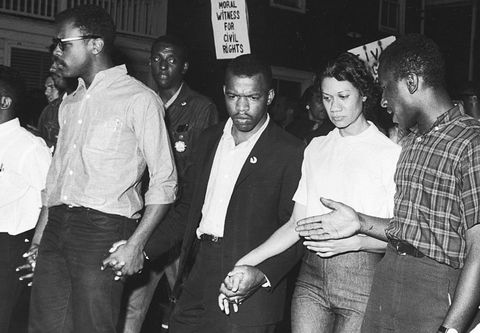 john lewis marching in a protest