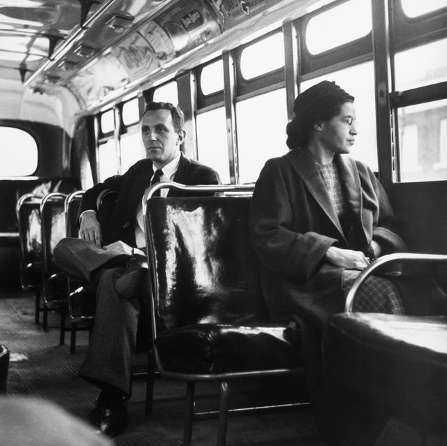 rosa parks sits in the front of a bus in montgomery, alabama, after the supreme court ruled segregation illegal on the city bus system on december 21, 1956