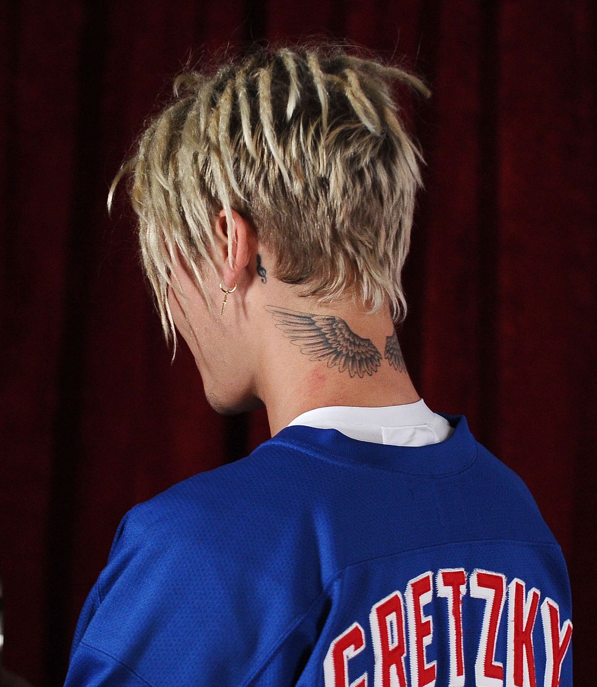 inglewood, california   april 03  justin bieber, hair detail, poses in the press room at the iheartradio music awards at the forum on april 3, 2016 in inglewood, california  photo by jason laverisfilmmagic