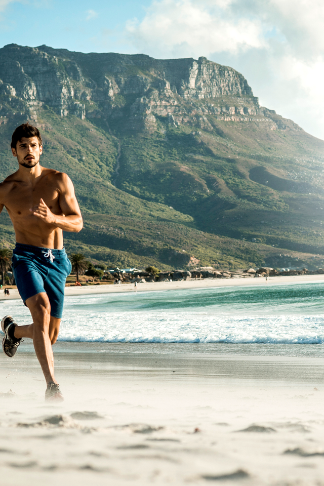 man running beach