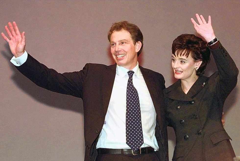 brighton, united kingdom september 30 britain's prime minister tony blair and wife cherie wave to the crowd 30 september, after the prime minister made his first speech as leader of the new british government, to the labour party conference electronic image photo credit should read johnny eggittafp via getty images