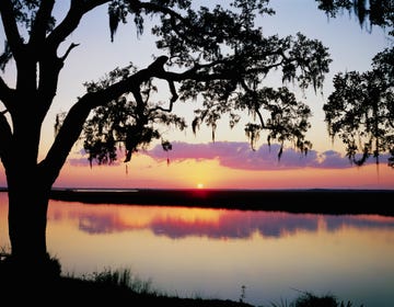 a sunset over a lake