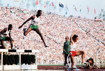kipchoge keino (c) chases bronislaw malinowski (r) in the mens 3000m steeplechase final at the athletics event during the munich 1972 olympic games on september 5, 1972, in munich. keino won gold and also took a silver medal in the 1500 meter race. first kenyan runner, keino is known for his high altitude training, which helped introduced a technique to improve running time at any altitude. keinos most acclaimed victory came at the 1968 olympics, where, after having to jog a mile to the stadium because his taxi was stuck in traffic, he set an olympic record and won the 1500 meter race. / afp / (photo credit should read /afp via getty images)