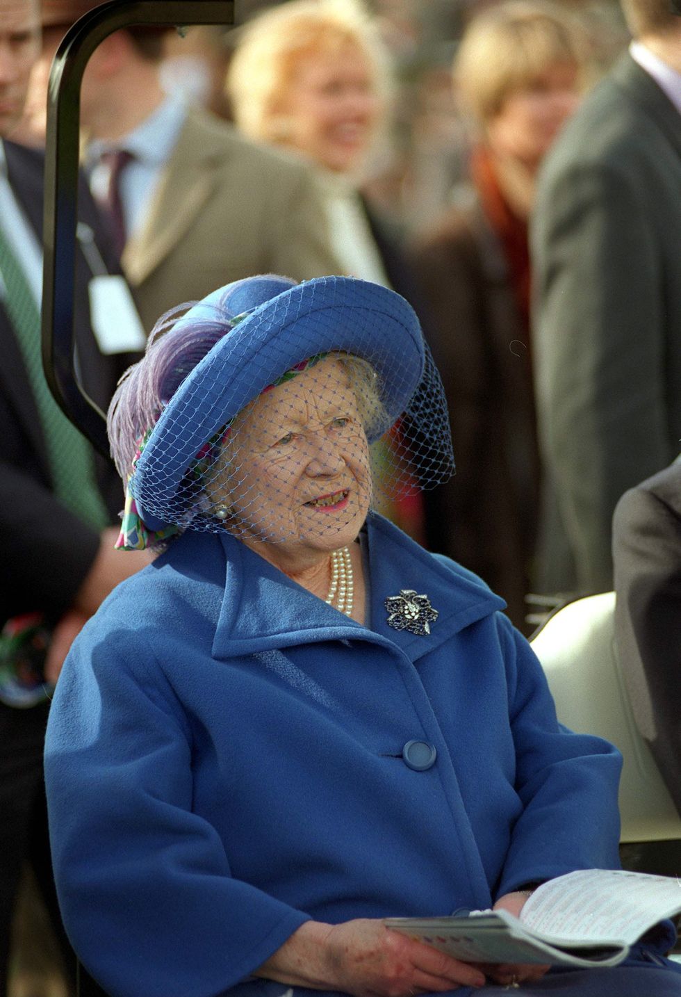 cheltenham, united kingdom   march 18  the queen mother at cheltenham races to see the queen mother championship hurdle in her buggygolf cart  photo by tim graham photo library via getty images
