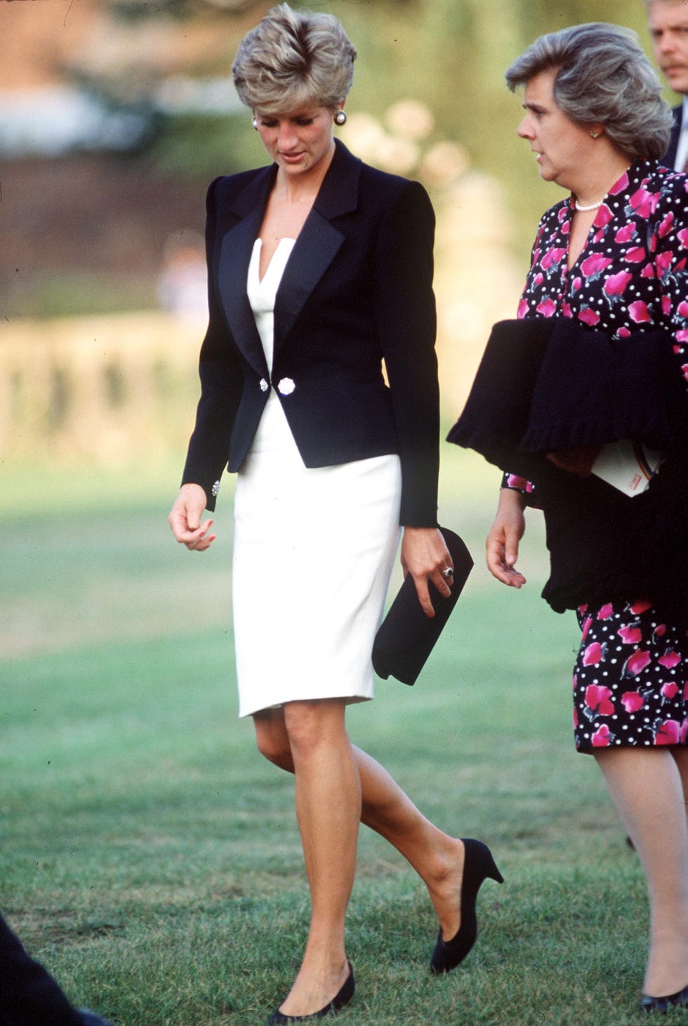 salisbury, united kingdom september 06 princess diana wearing a white knee length dress with a black jacket designed by catherine walker during her visit to salisbury the princess is talking to her lady in waiting anne beckwith smith photo by tim grahamgetty images