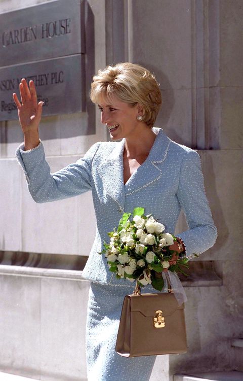 london, united kingdom   april 21  diana, princess of wales, leaving the british lung foundation in hatton garden after being  presented with a bouquet of the first rose named after her diana's suit is designed by fashion designer chanel and she is carrying a handbag designed by fashion designer lana marks  photo by tim graham photo library via getty images