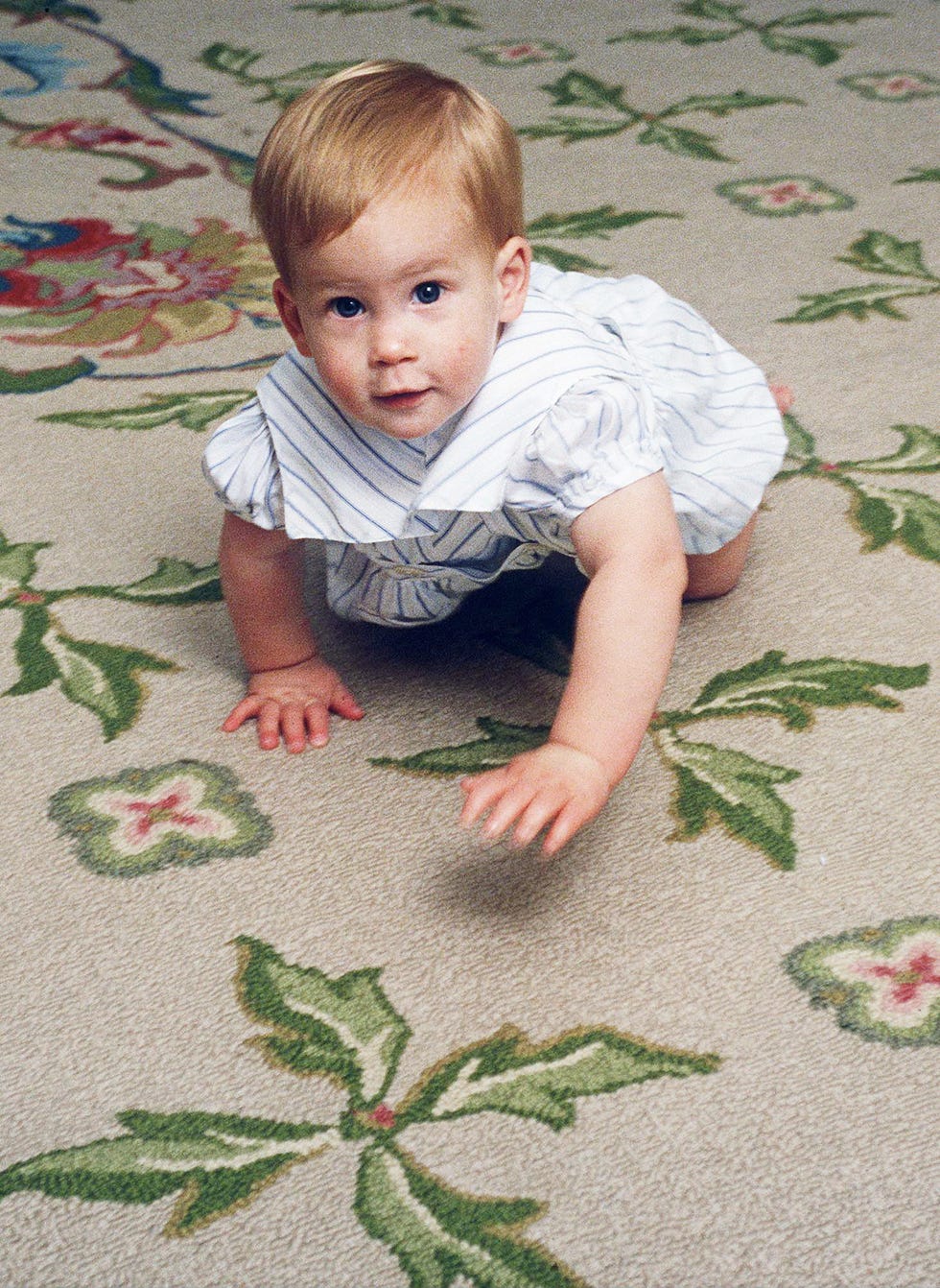prince harry learning to crawl at home in kensington palace