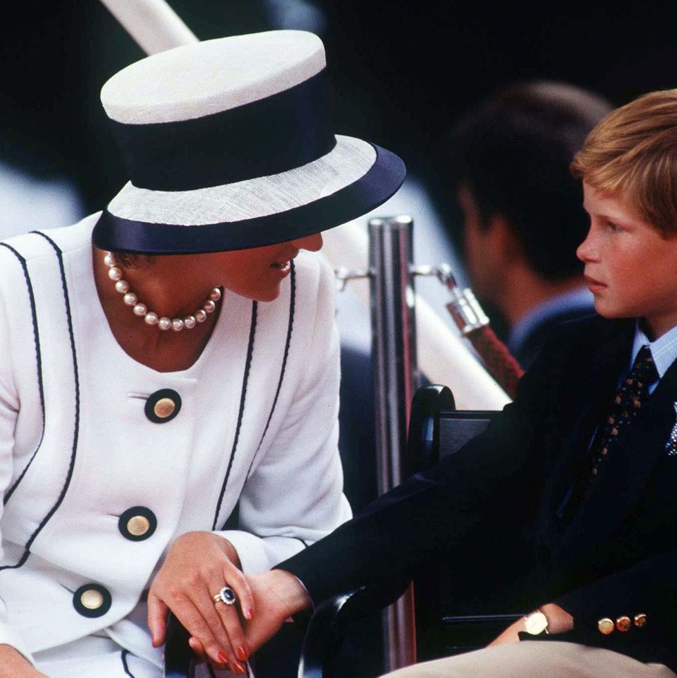 london, united kingdom august 19 princess diana holding prince harrys hand whilst watching the parade of veterans on v j day, the mall, london photo by tim graham photo library via getty images