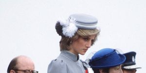 auckland, new zealand   april 25  princess diana and, behind her, edward adeane the prince of waless private secretary attending an anzac day parade at auckland war memorial new zealand  photo by tim graham photo library via getty images