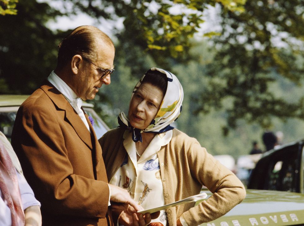 windsor, united kingdom   may 16  the queen and prince philip chatting together during the royal windsor horse show in the grounds of windsor castle  photo by tim graham photo library via getty images