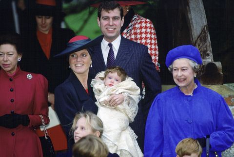 ​Princess Margaret, the Duchess Of York, Prince Andrew, and the Queen attend the christening of Princess Eugenie, center.