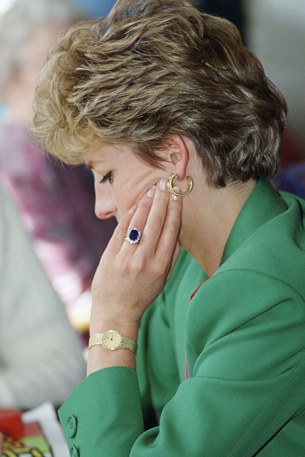 united kingdom   april 28  diana, princess of wales, wearing her diamond and sapphire engagement ring bought from garrards, the crown jewellers with a gold watch and gold earrings  photo by tim graham photo library via getty images