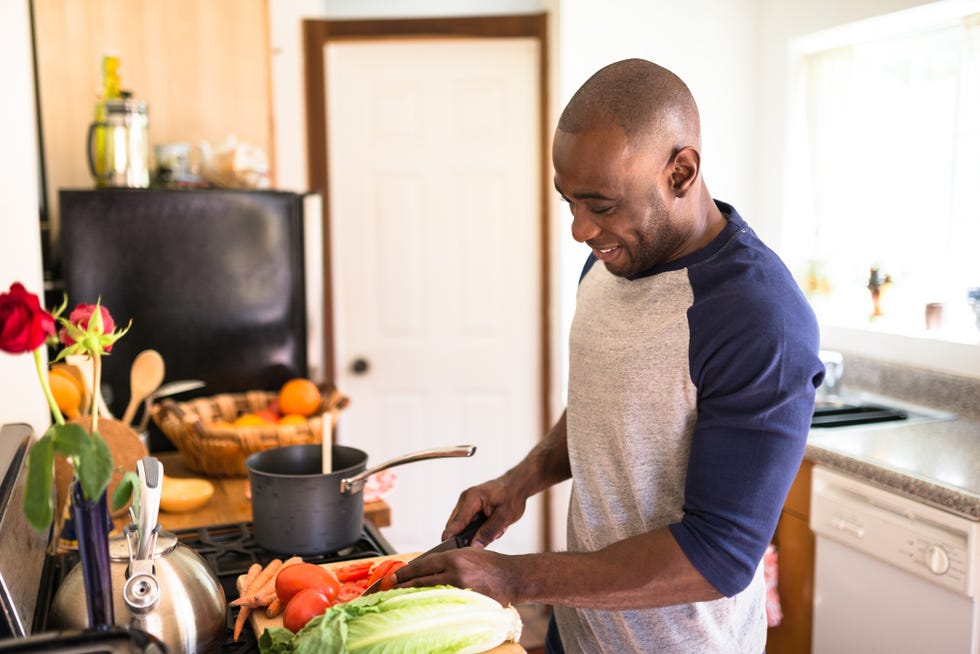 man standing happiness on the kitchen