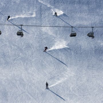 piste with skiers in davos switzerland