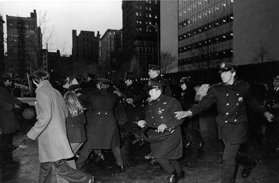 after the barricades are broken in front of the criminal courts building, police officers begin to break up groups of protestors who responded with everything from name calling to thrown bottles, new york, new york, february 16, 1970 the protest was related to events surrounding the political demonstrations held at the chicago democratic convention photo by garth eliassenpictorial paradegetty images