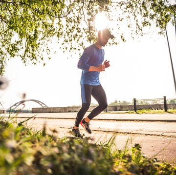 Jog on a sunny day handsome male athlete jogging on a sunny day