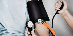 Wrist, Stethoscope, Arm, Hand, Leg, Medical equipment, Strap, Thigh, Electronic device, Cable, 