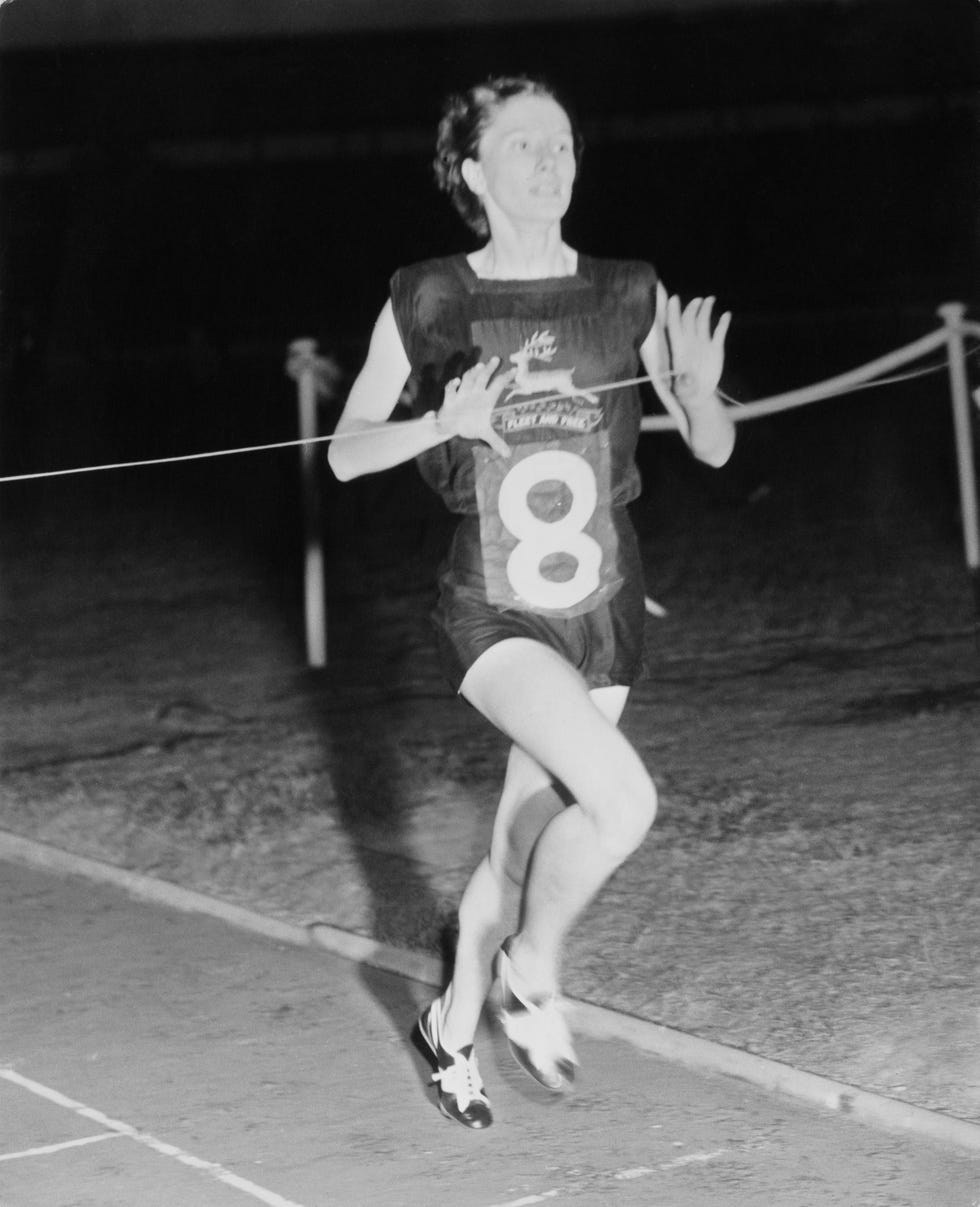 british runner diane leather winning the one mile event at the international athletic meeting at white city, london, 21st september 1955 she beat her own world record and set a new time of 4 mins 45 seconds in may 1954, leather became the first woman to run a mile in less than 5 minutes photo by reg burkettkeystonehulton archivegetty images