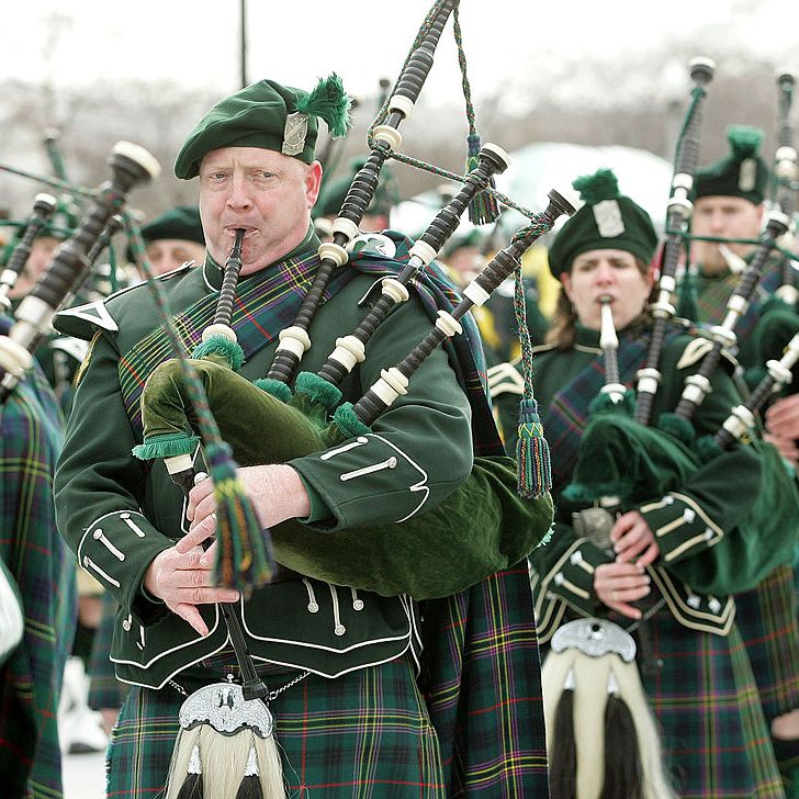 people playing the bagpipes, st patrick's day captions