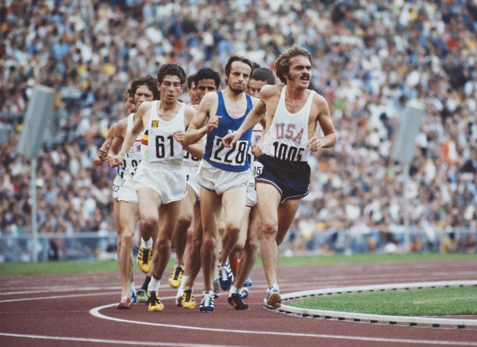 steve prefontaine 1005 of the united states leads lasse viren of finland 228 and emiel puttemans of belgium 61 during the mens 5,000 metres event at the xx summer olympic games on 10 september 1972 at the olympic stadium in munich, germanyphoto by tony duffygetty images