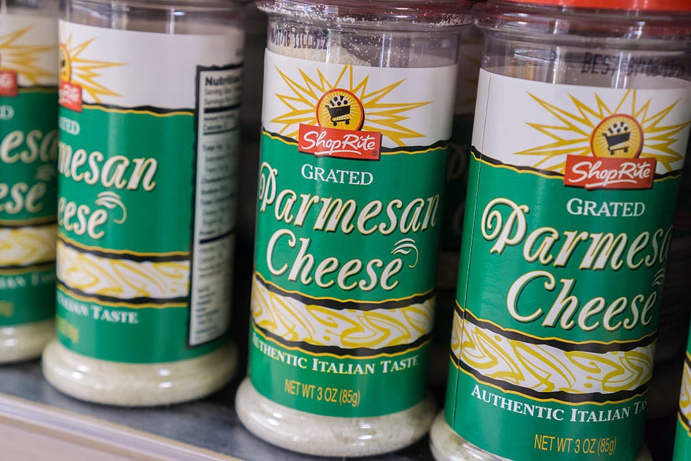 containers of house brand parmesan cheese on a supermarket shelf in new york on tuesday, february 16, 2016 an investigation by bloomberg news found that some manufacturers of parmesan cheese are using larger proportions of cellulose, a wood product filler, than allowed in their products �� richard b levine photo by richard levinecorbis via getty images