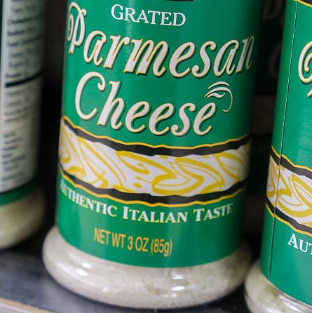 containers of house brand parmesan cheese on a supermarket shelf in new york on tuesday, february 16, 2016 an investigation by bloomberg news found that some manufacturers of parmesan cheese are using larger proportions of cellulose, a wood product filler, than allowed in their products �� richard b levine photo by richard levinecorbis via getty images