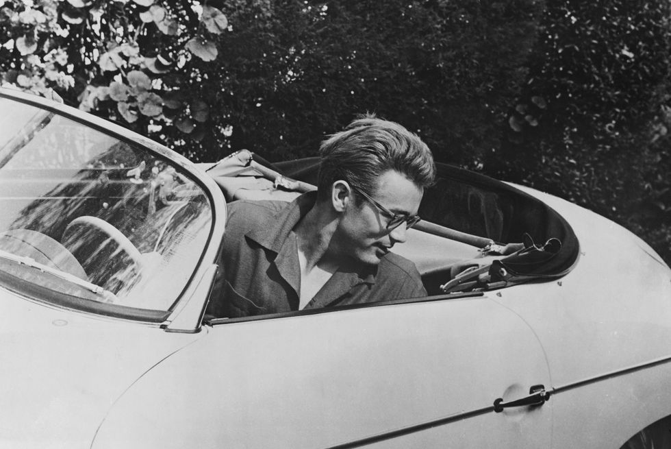 James Dean Seated in his Roadster