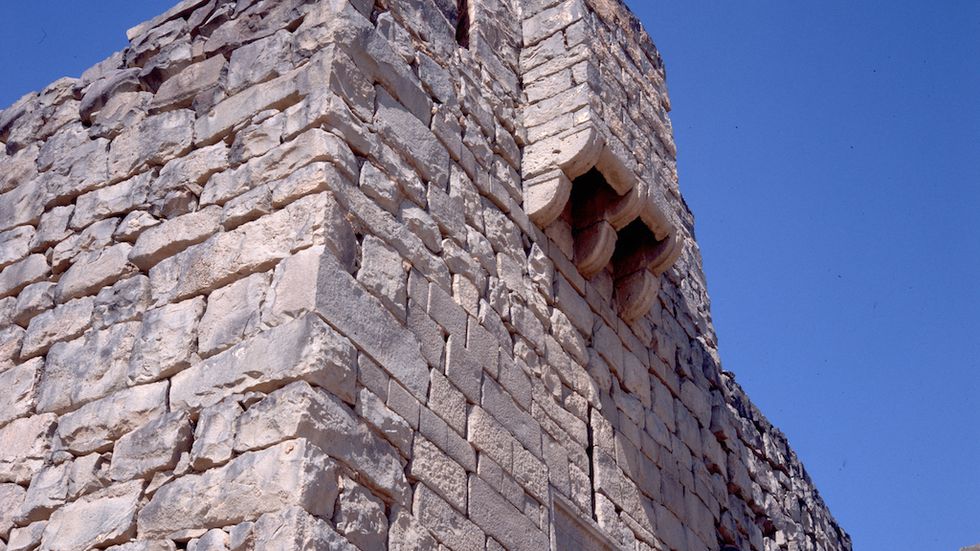 Parapet at Qasr al-Asrag fort. Dating to the 13th century, the holes in the fort were designed to dispense boiling oil.