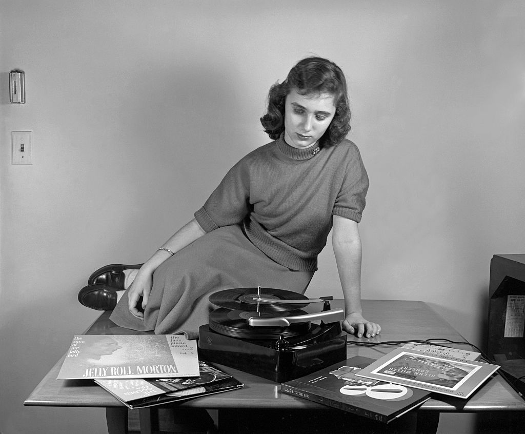 Woman listening to records