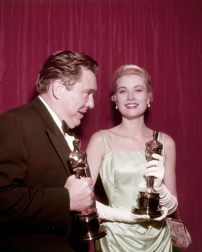 How much is an Oscar award worth and what material is it made of?