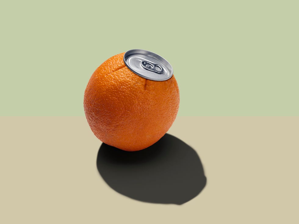 an orange with a watch on it