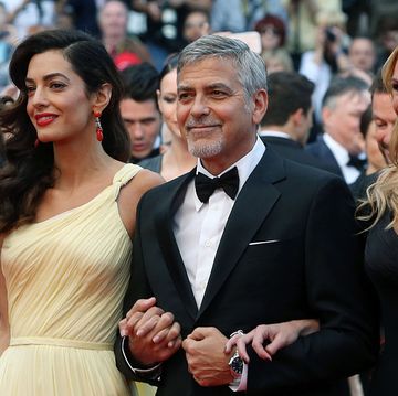 cannes, france   may 12  actor george clooney, his wife amal clooney and actress julia roberts attend the money monster premiere during the 69th annual cannes film festival at the palais des festivals on may 12, 2016 in cannes, france  photo by danny martindalefilmmagic
