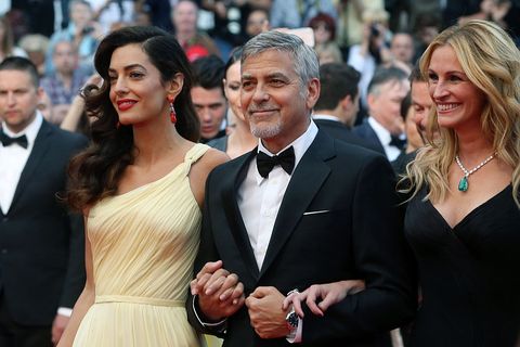 cannes, france   may 12  actor george clooney, his wife amal clooney and actress julia roberts attend the money monster premiere during the 69th annual cannes film festival at the palais des festivals on may 12, 2016 in cannes, france  photo by danny martindalefilmmagic