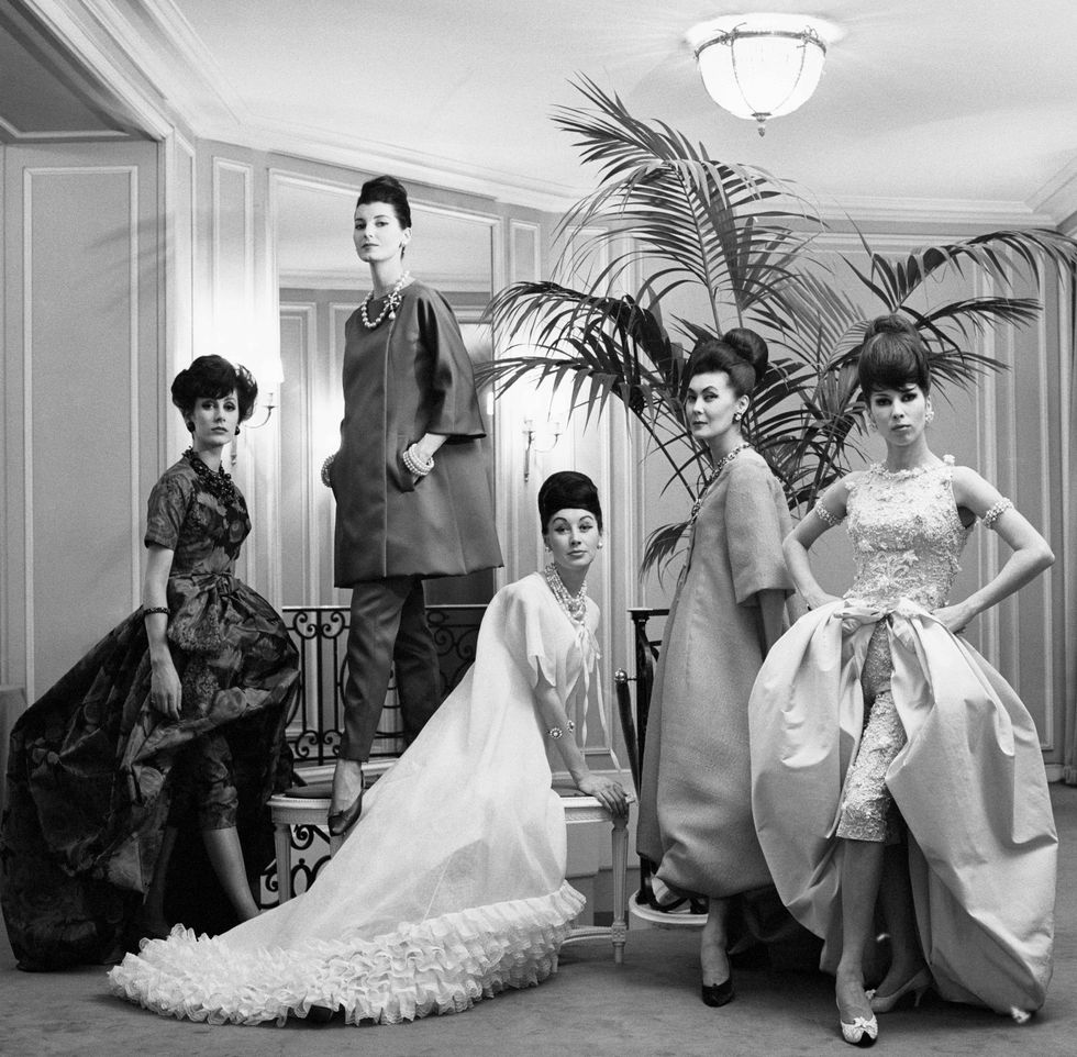 models wear the latest fashions from the christian dior in the late 1960s