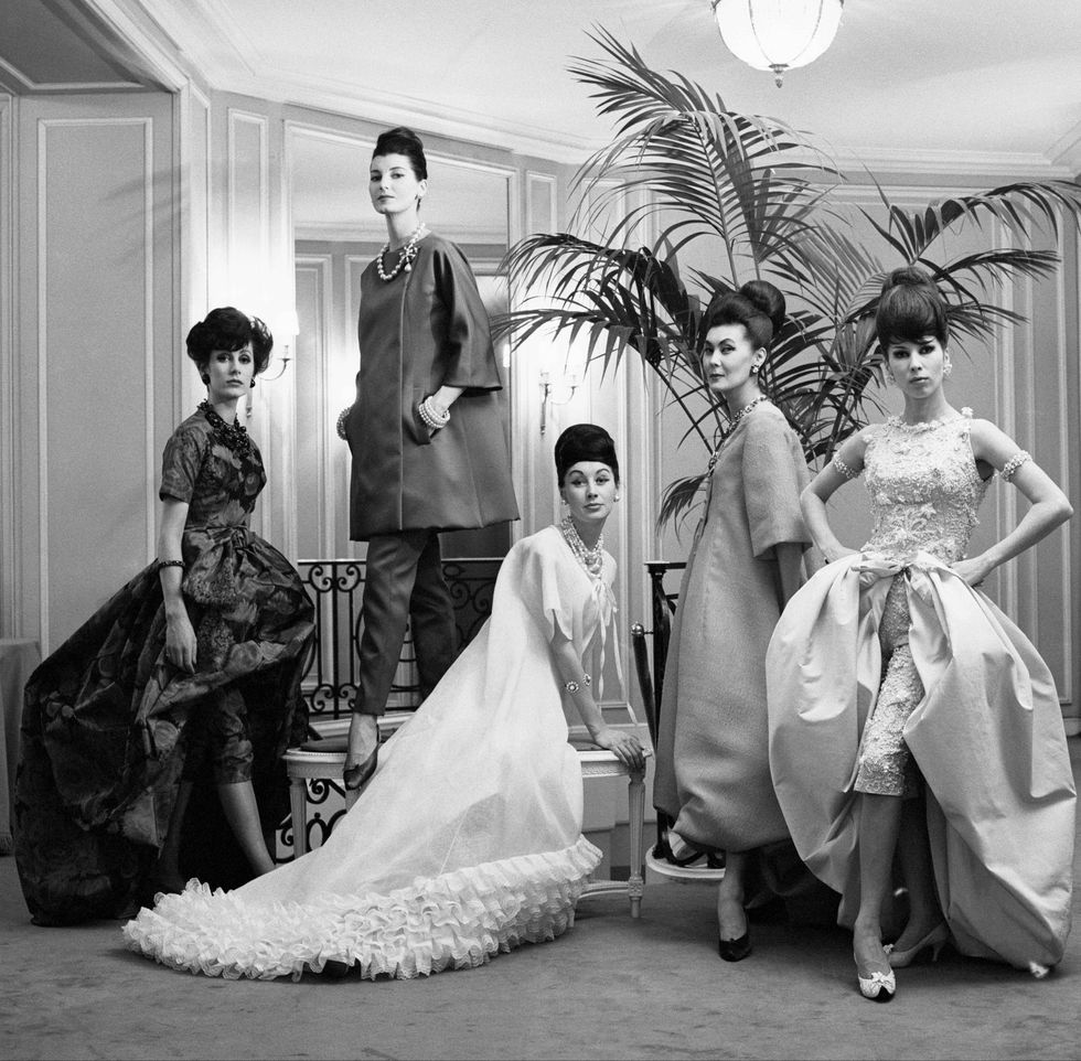 models wear the latest fashions from the christian dior in the late 1960s