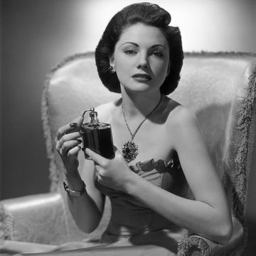 united states circa 1950s woman applying perfume