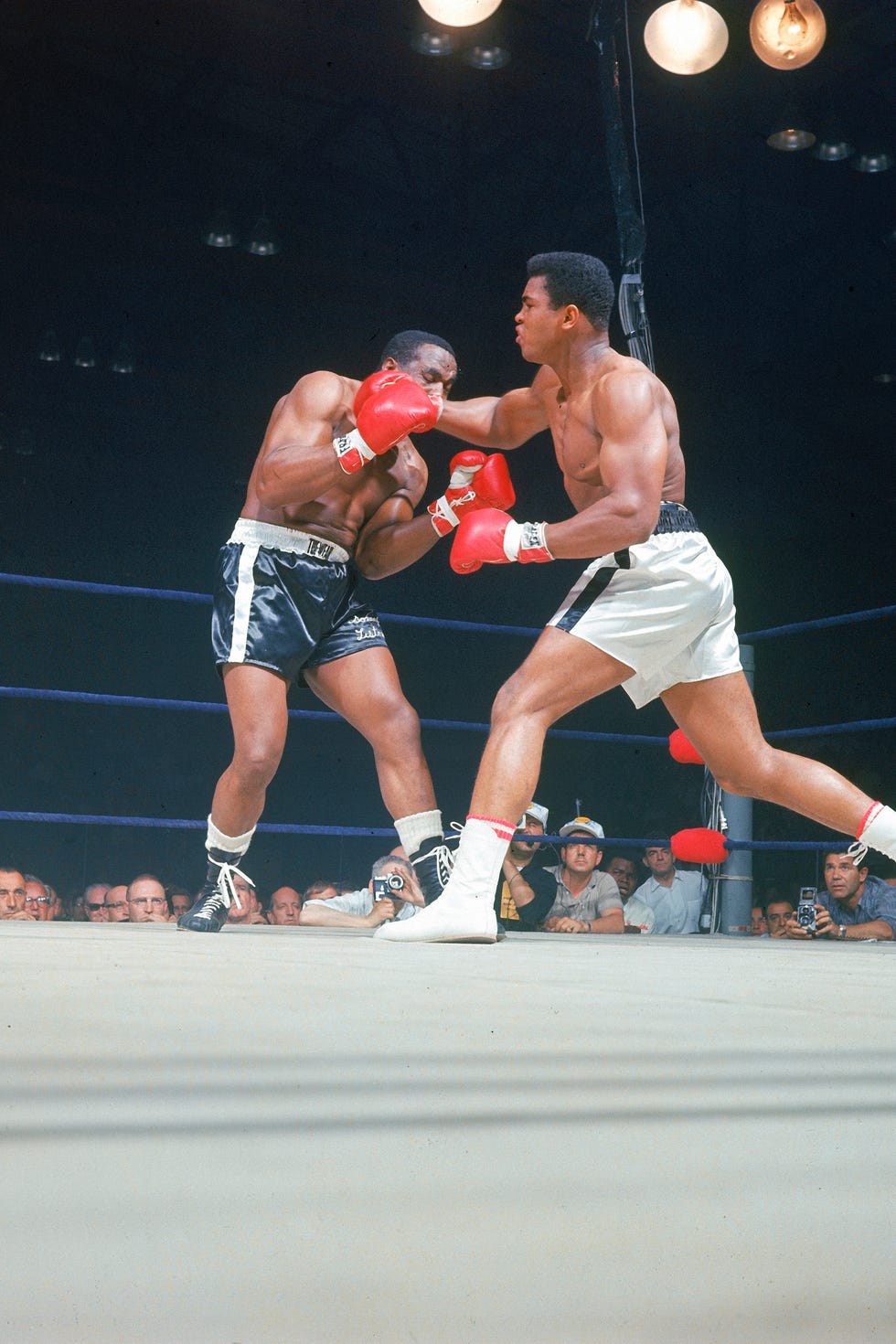 Muhammad Ali throws a punch during the first round of his rematch with Sonny Liston Muhammad Ali throws a punch during the first round of his rematch with Sonny Liston