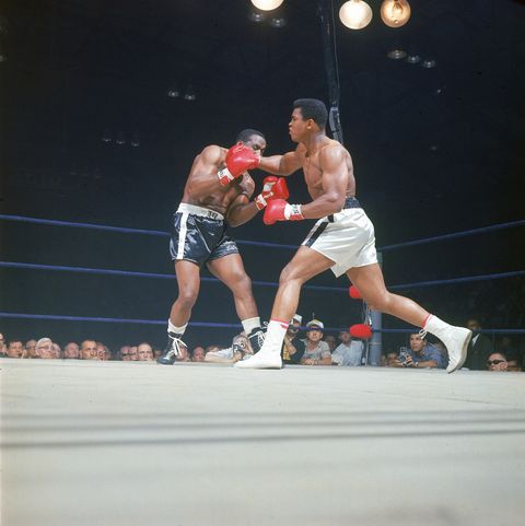 Muhammad Ali throws a punch during the first round of his rematch with Sonny Liston