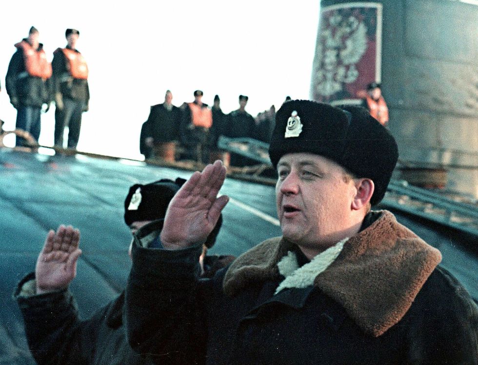 kursk’s commanding officer, gennady lyachin, saluting after a patrol in the mediterranean sea