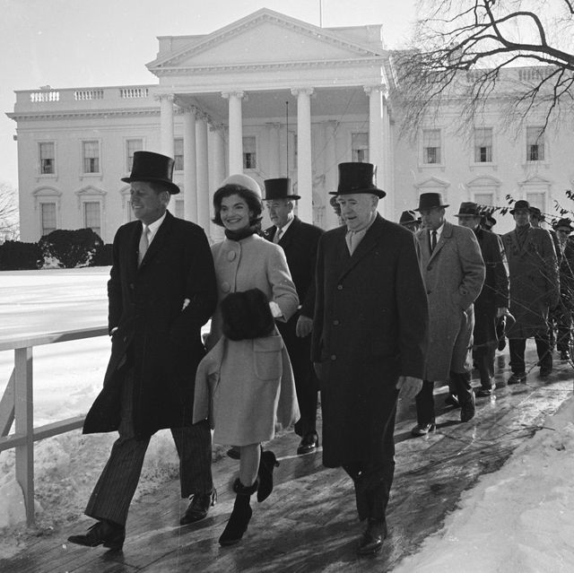 married couple, us president elect john f kennedy 1917   1963 and jacqueline kennedy nee bouvier, later onassis, 1929 – 1994, along with others, walk to the formers inauguration day ceremony, washington dc, january 20, 1961 photo by paul schutzerthe life picture collection via getty images
