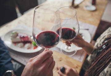 Red wine, Wine glass, Drink, Wine, Stemware, Glass, Hand, Wine tasting, Alcoholic beverage, Glasses, 