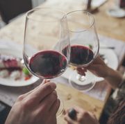 Red wine, Wine glass, Drink, Wine, Stemware, Glass, Hand, Wine tasting, Alcoholic beverage, Glasses, 