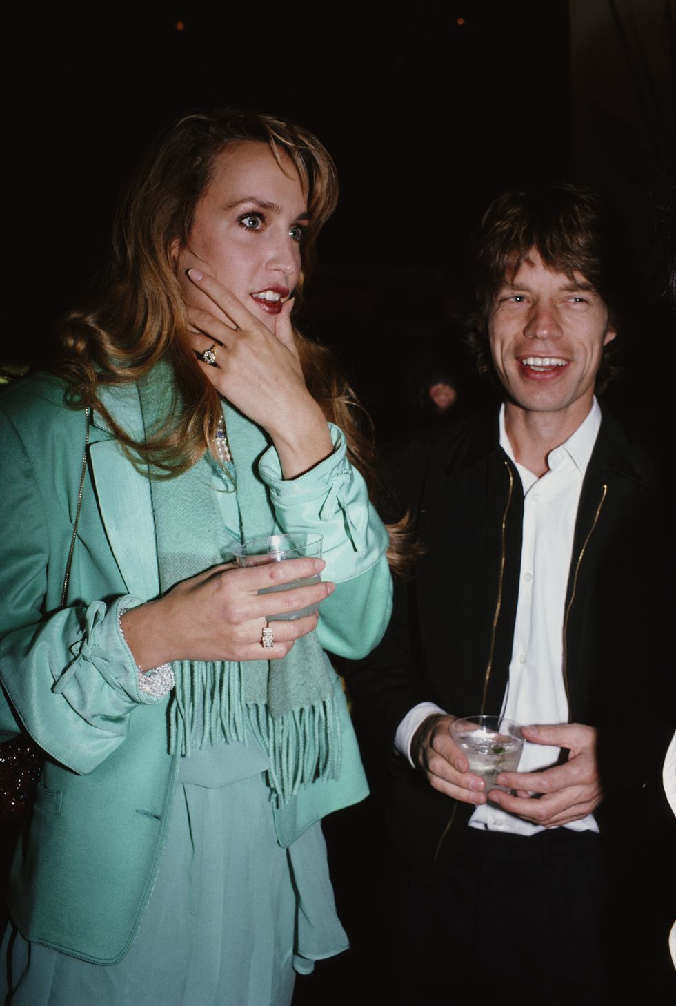 english musician and singer songwriter mick jagger with his girlfriend american model and actress jerry hall attend an event being held at bloomingdales department store, new york city, usa, 1980 photo by rose hartmanarchive photosgetty images