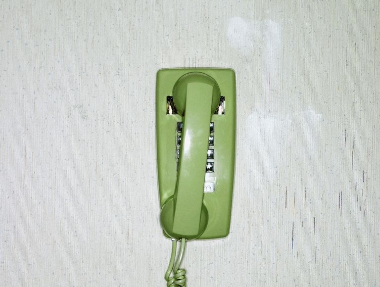 Green Phone on Wall